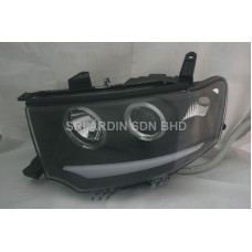 Mitsubishi Pajero 09-15 Black Projector Headlamp w Ring & Bar Mitsubishi Pajero 09-15 Black Projector Headlamp w Ring & Bar